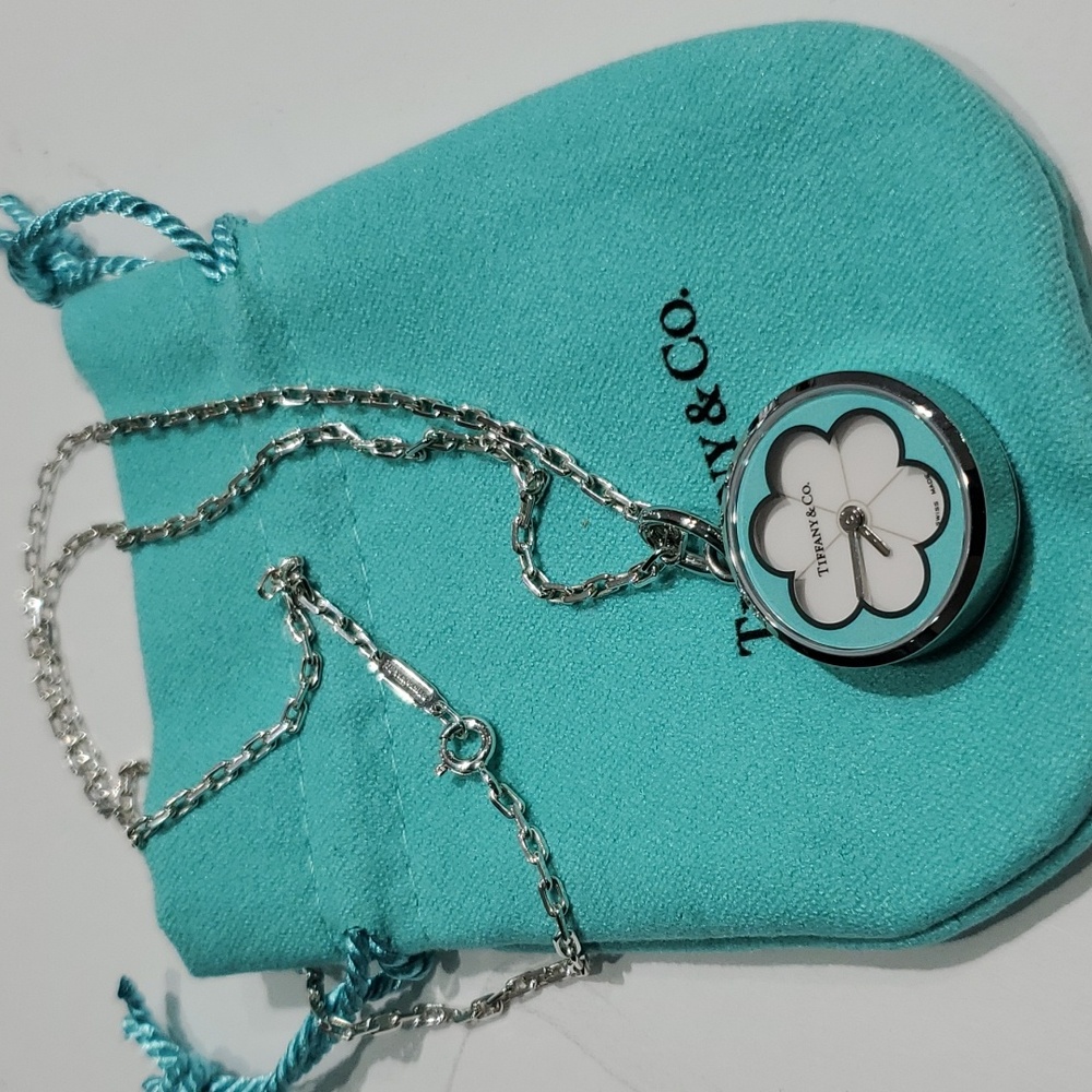Tiffany & Co. Silver Pendant Necklace with Tiffany Blue and White Flower Dial